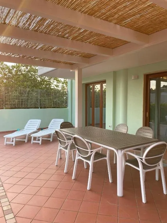 Aquagarden – patio con pergolato